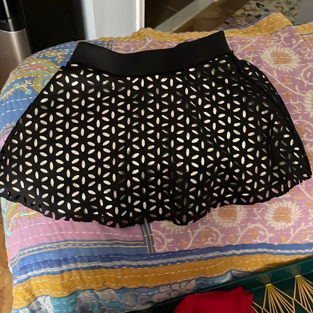 Girls skirt with gold underlay with black flower skirt overlay